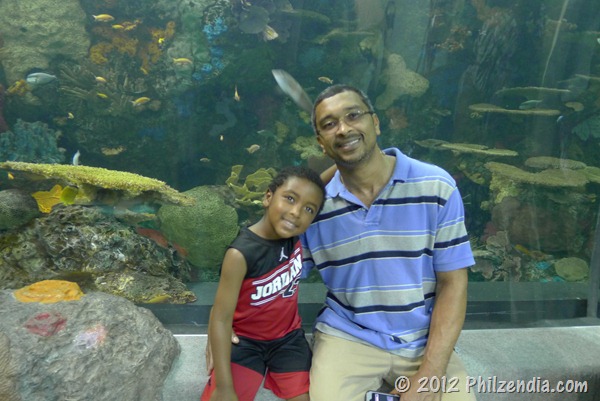 Hubby and son posing at the Virginia Aquarium