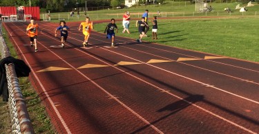 young athletes running track