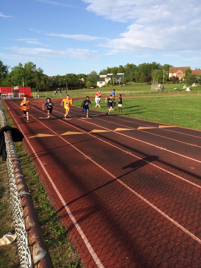 young athletes running track