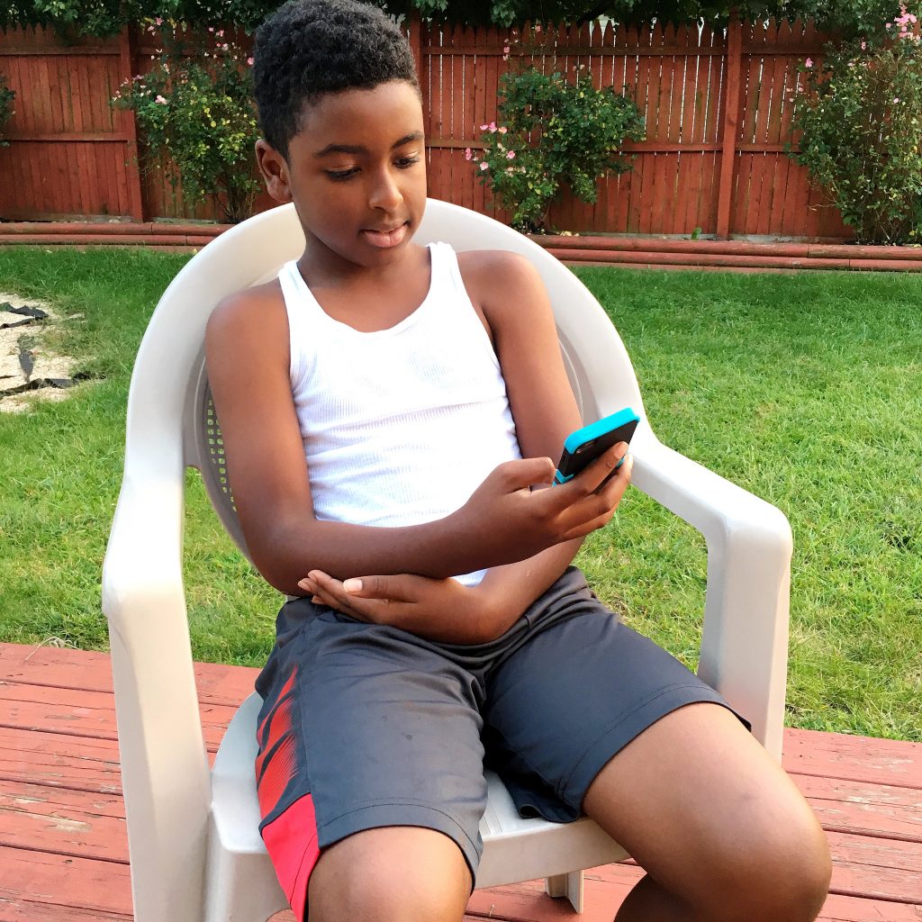 Z.E.N. playing with his iPod