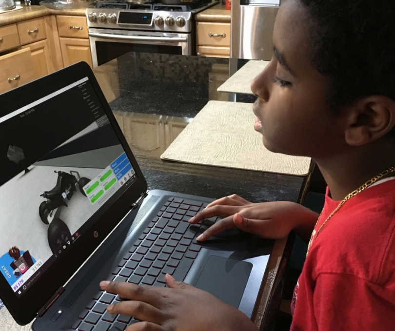 Playing video games on the new HP Omen gaming laptop available at Walmart